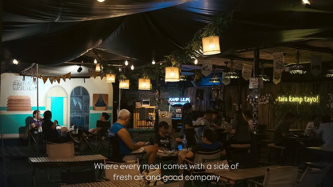 Kamp Lilim full dining hall at night — where every meal comes with fresh air